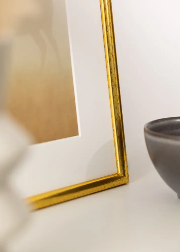 Estancia Frame Newline Gold 21x29,7 cm (A4)
